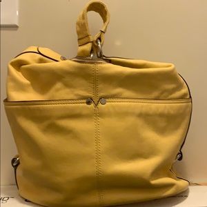 Tignanello mustard color purse